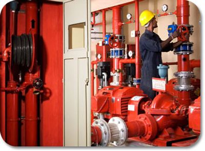 A fire sprinkler head with water spraying